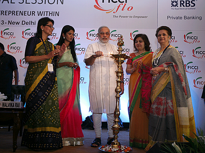 Flooring the women! Narendra Modi at the FICCI Ladies Organisation AGM, flanked by (from left) Naina Lal Kidwai, Kavita Varadaraj and Malvika Rai.